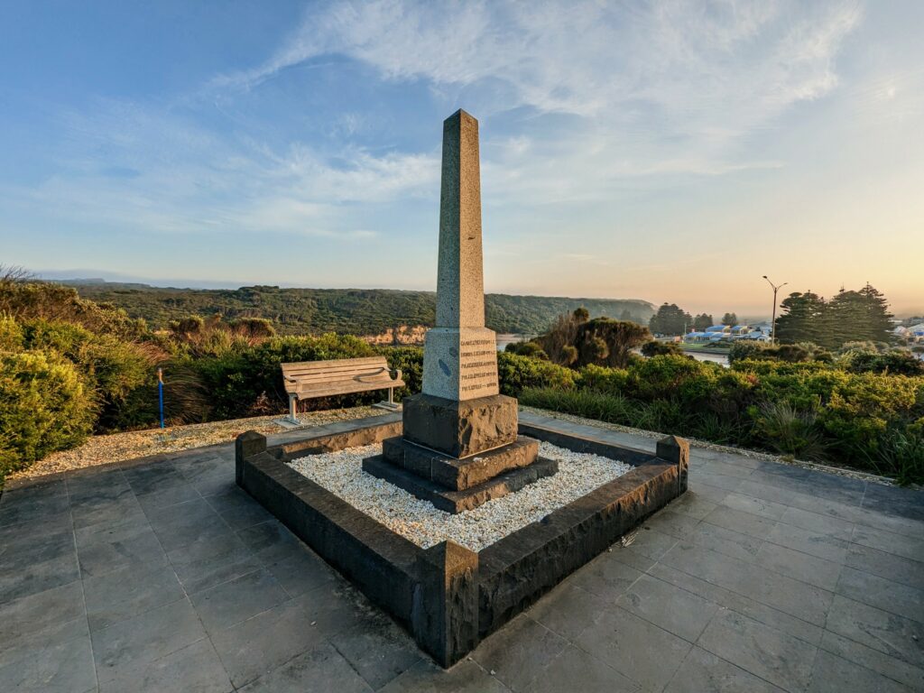 Solider's Memorial in Port Campbell, a stone obelisk on a small hill overlooking the town and beach